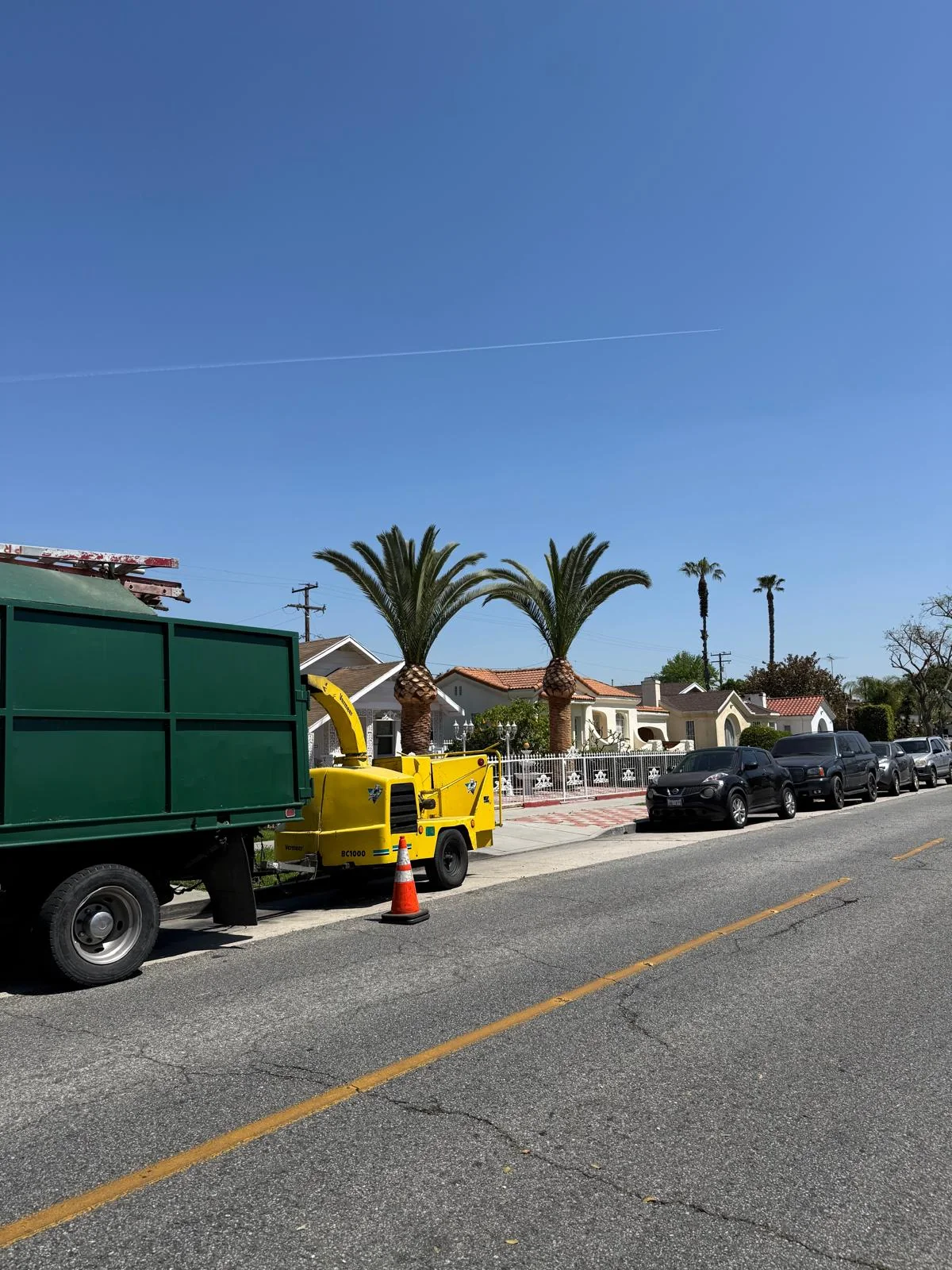 Chipper truck loaded and the street left clear